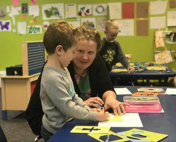 Miss Bri and a student